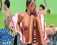 Sexy Topless Babes Tanning At The Pool